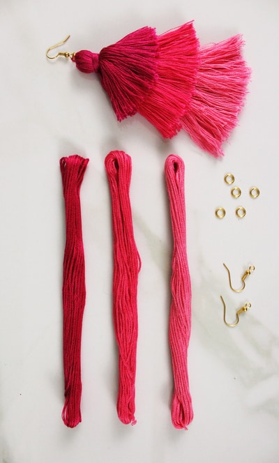 Materials required to make tassel earrings from embroidery string